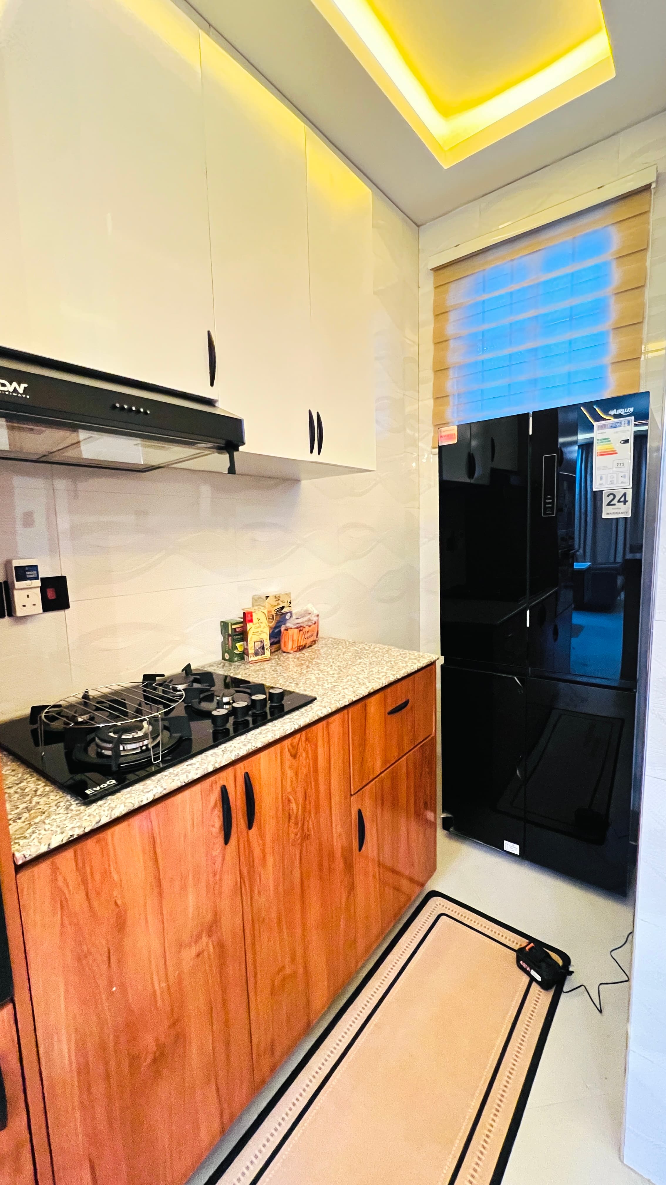 Gourmet Stovetop & Black Refrigerator